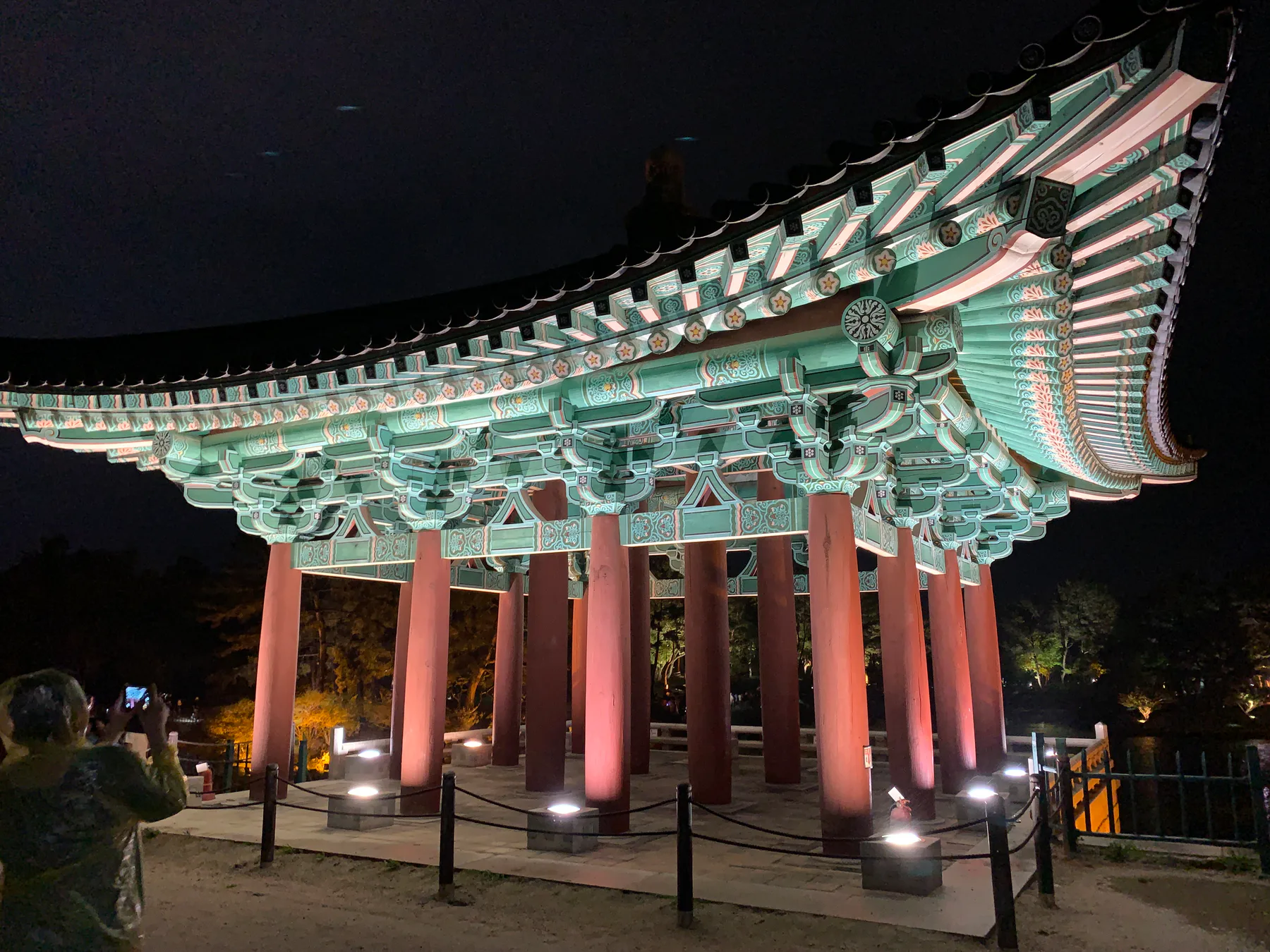 A lit temple roof detail in Gyeongju at night.