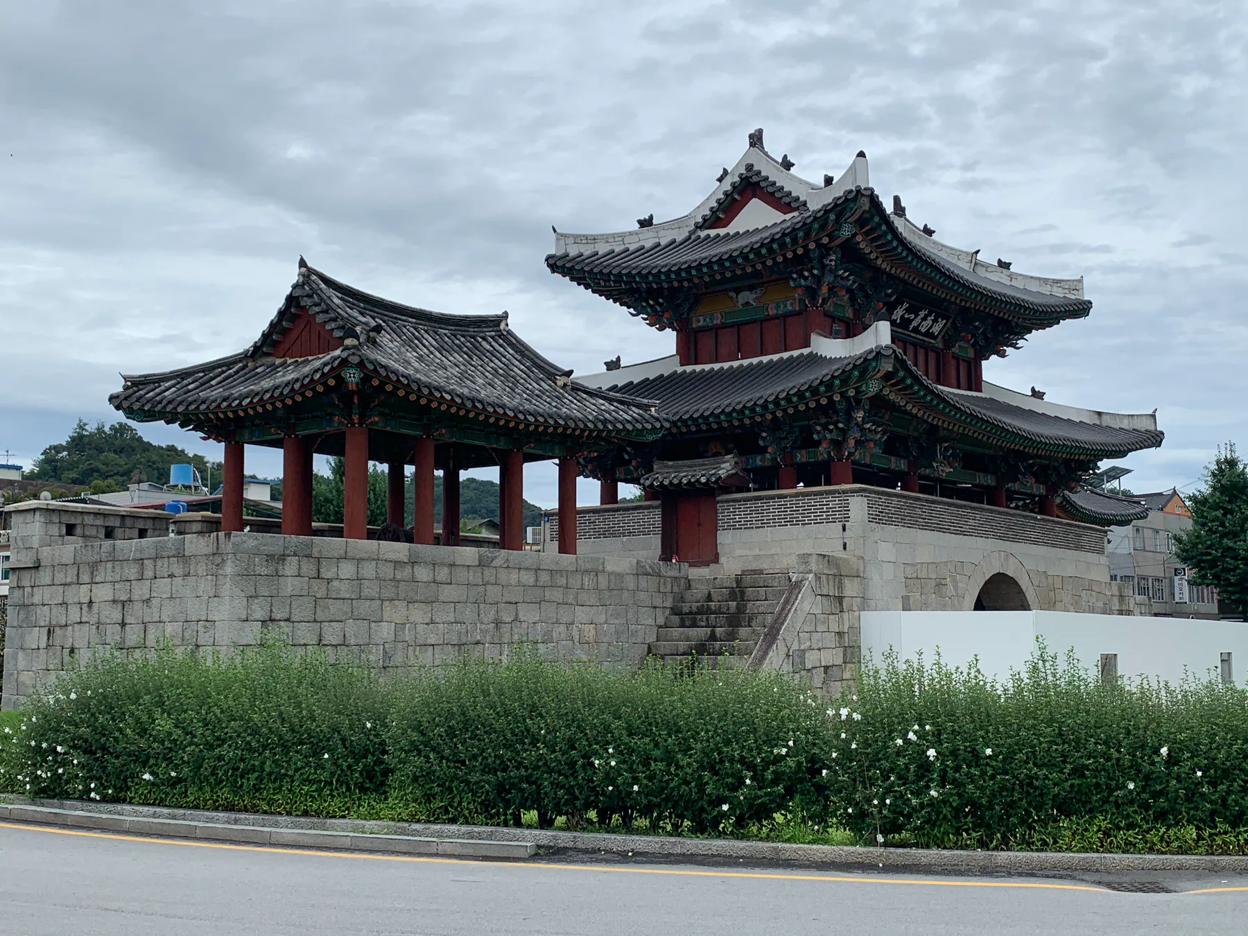 A traditional roofline and pavilion wall in Jeonju.