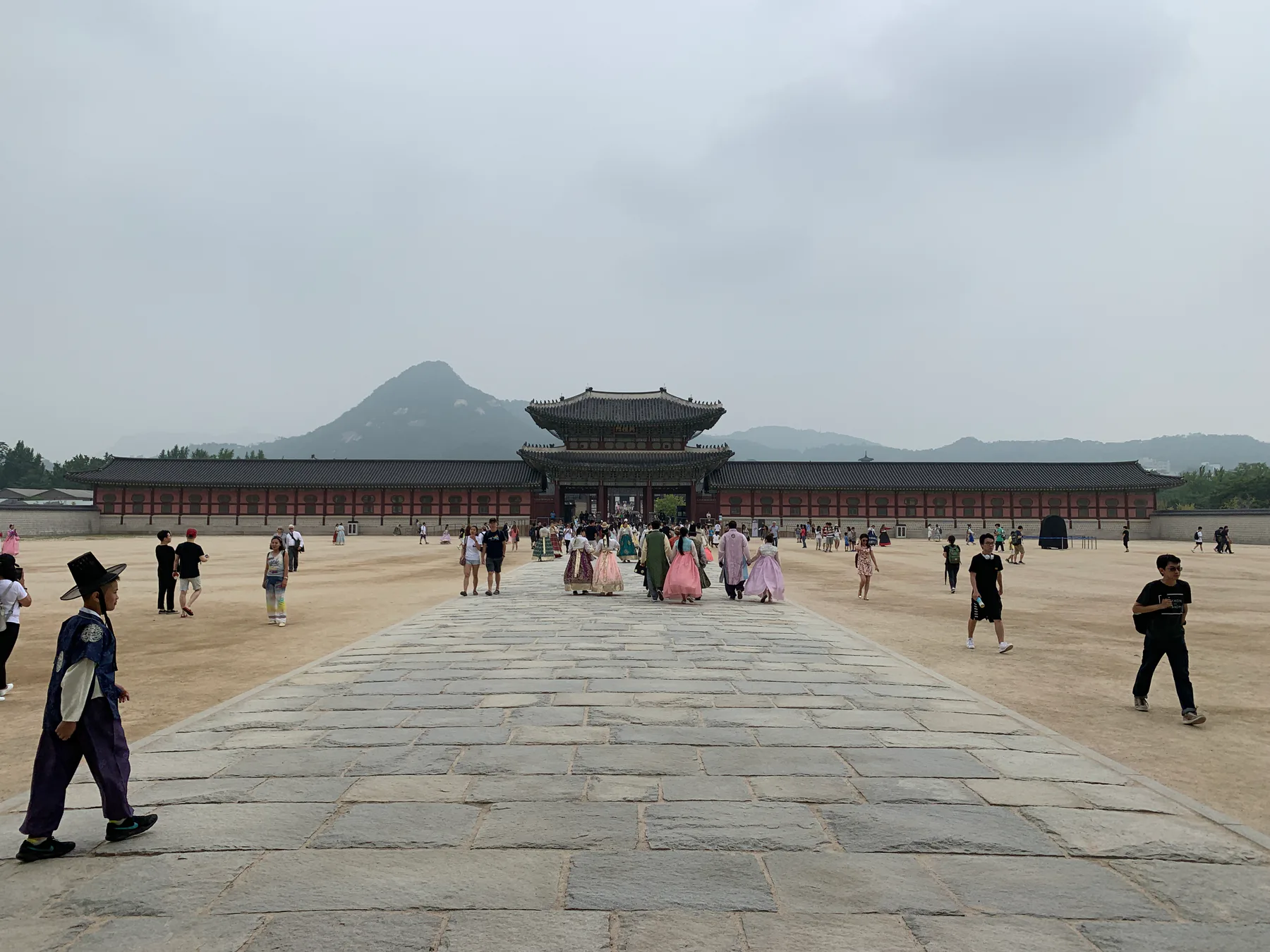 The wide stone approach to Gyeongbokgung Palace in Seoul.